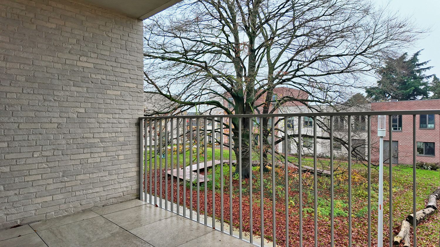 Nieuwbouw appartement met zuidgericht terras in het groene Louisepark te Eeklo! foto 9