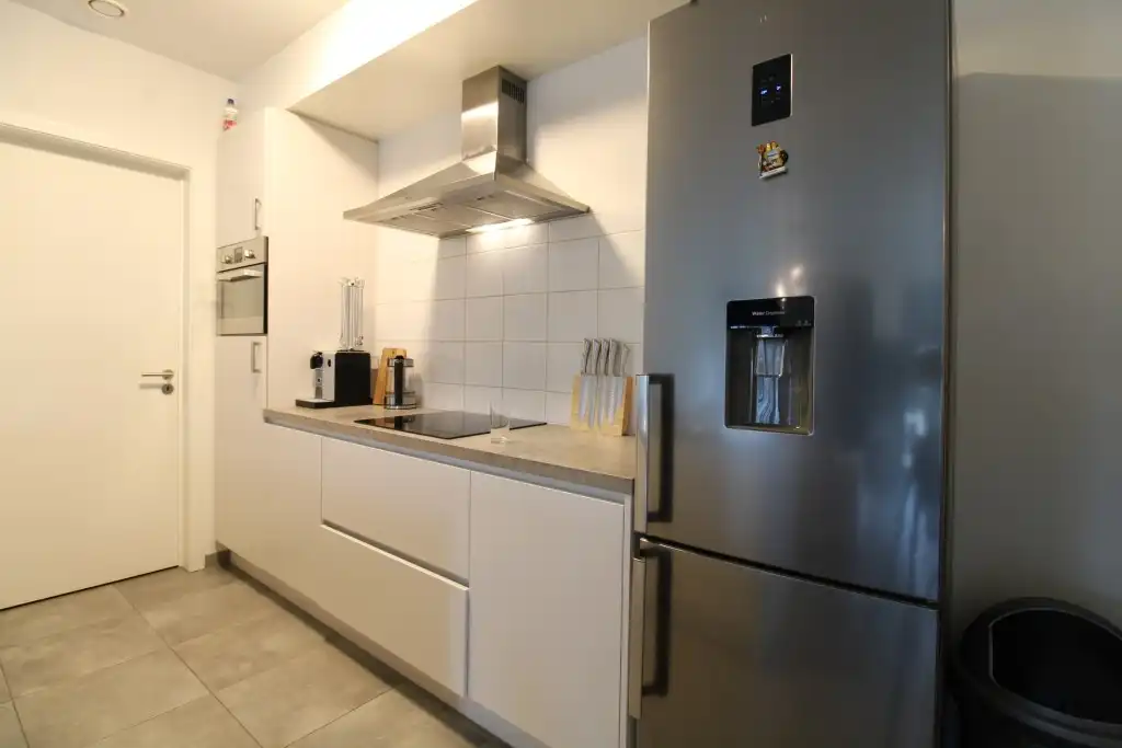 Prachtig appartement gelegen op de 1ste V met ondergrondse autostaanplaats en 2 fietsenstallingen.  foto 10