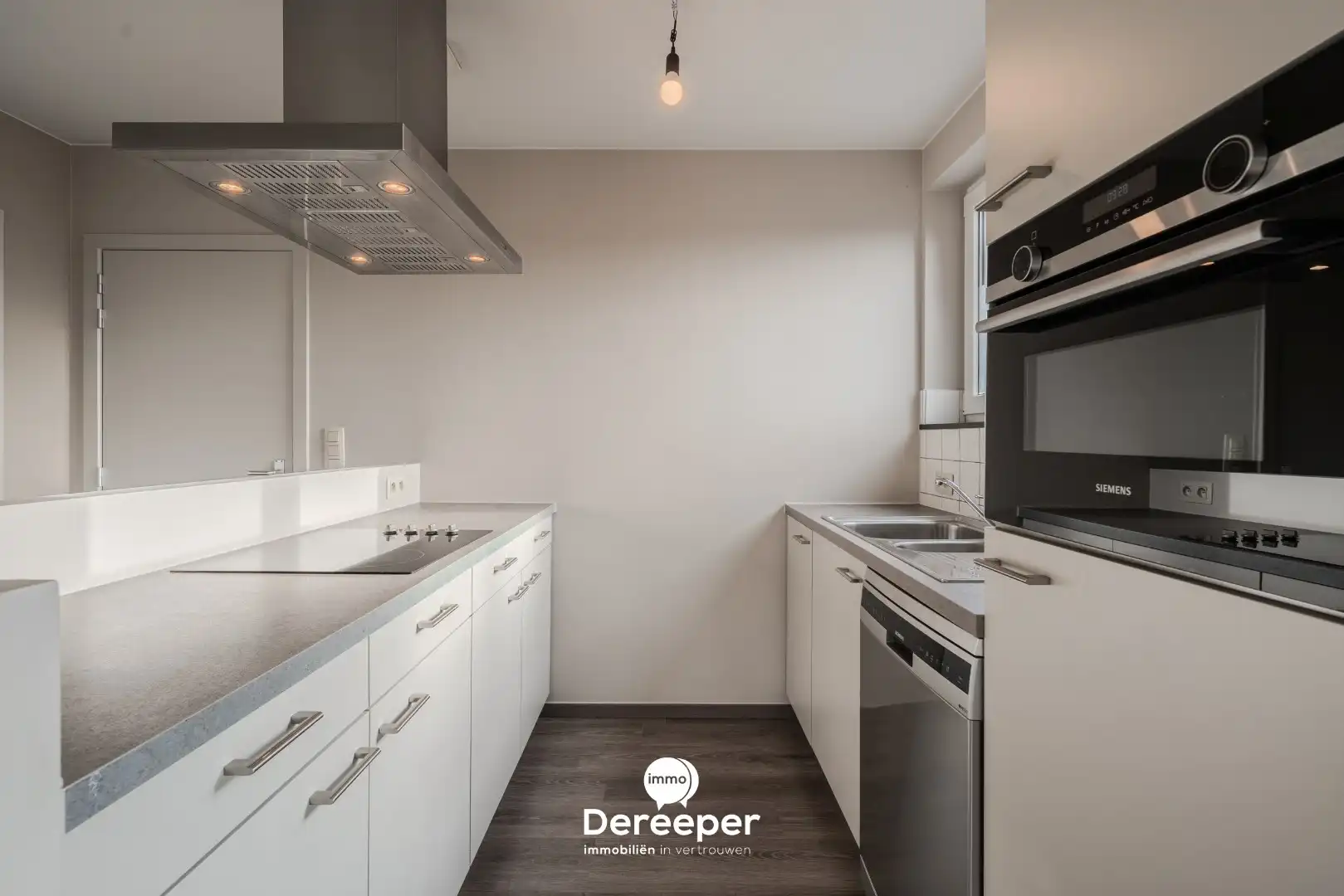 Modern en ruim duplexappartement met 3 slaapkamers in het centrum van Zerkegem foto 4
