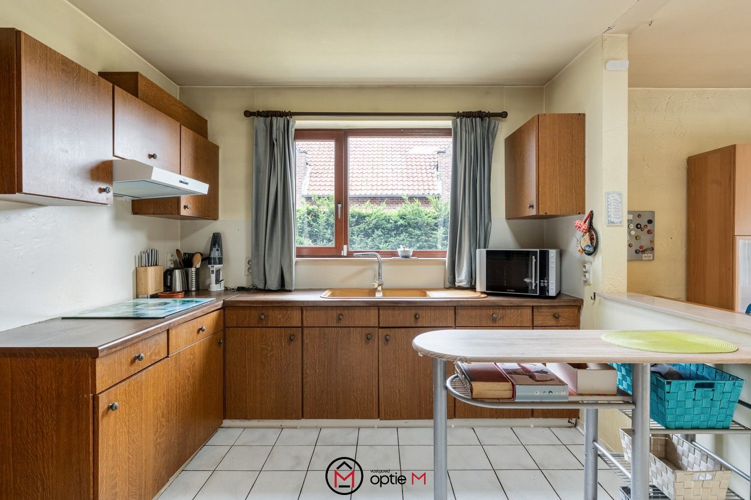 Rustig gelegen gezinswoning met 4 slaapkamers en ruime tuin foto 7