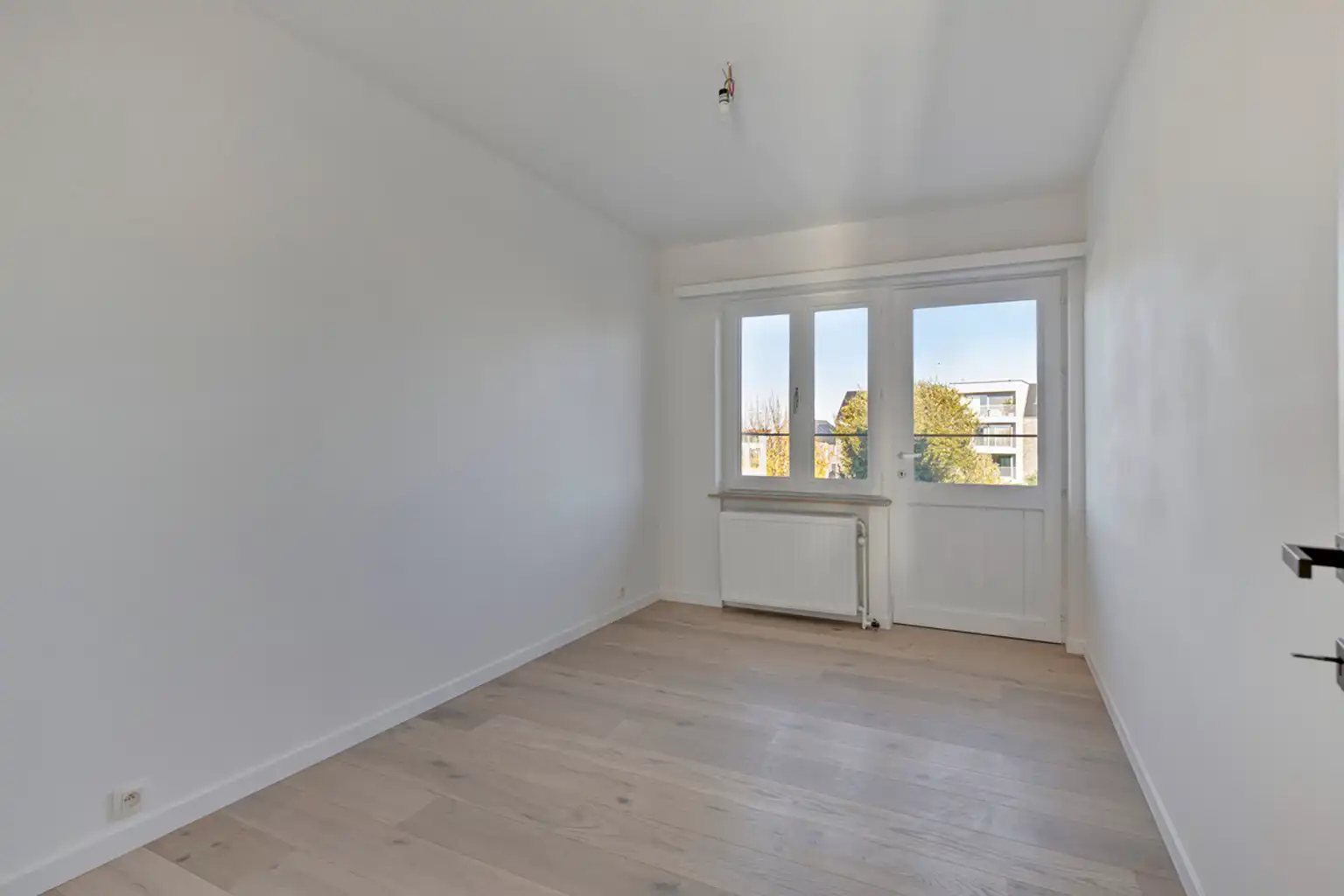 Volledig gerenoveerd en instapklaar 2 slaapkamer appartement foto 12