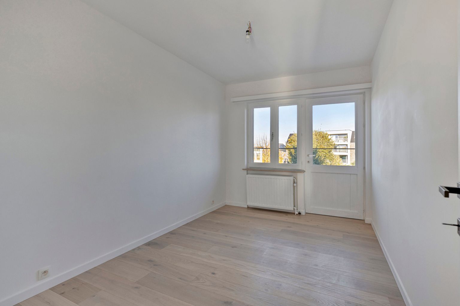 Volledig gerenoveerd en instapklaar 2 slaapkamer appartement foto 12