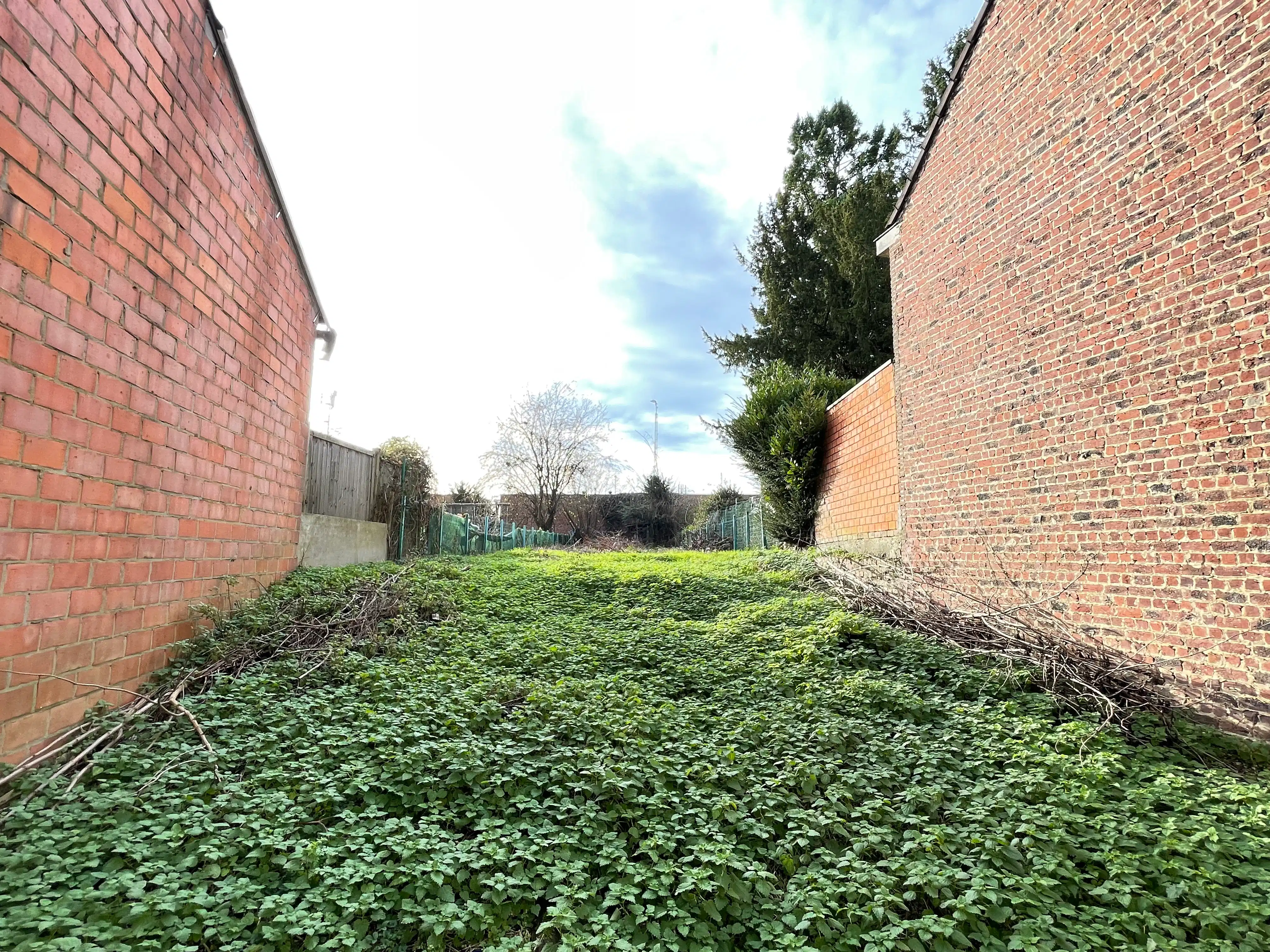 Bouwgrond 2 gevel woning met tuin foto 4