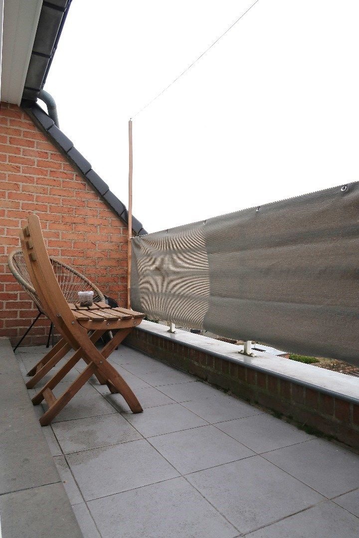 Opbrengsteigendom met 3 appartementen en 3 garageboxen. Ideale investering! foto 14