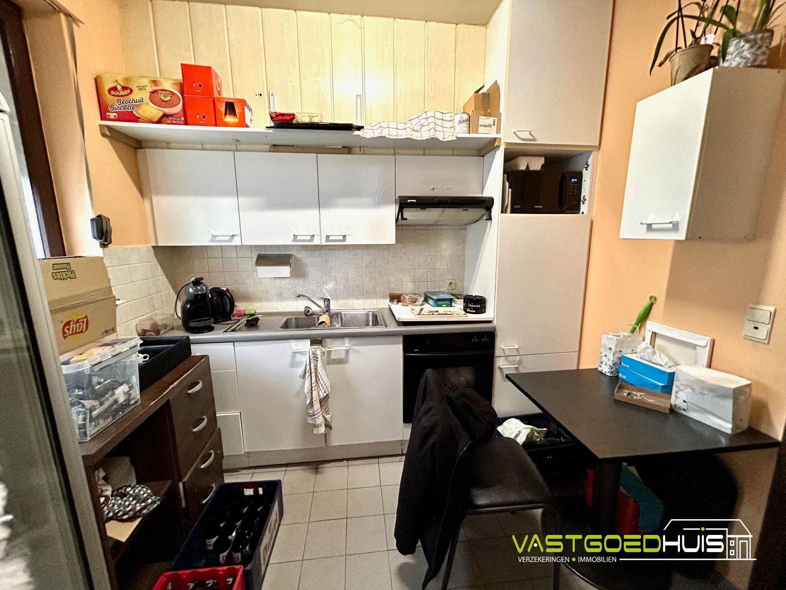 Opbrengsteigendom: handelspand, 2 appartementen en 2 garages foto 10