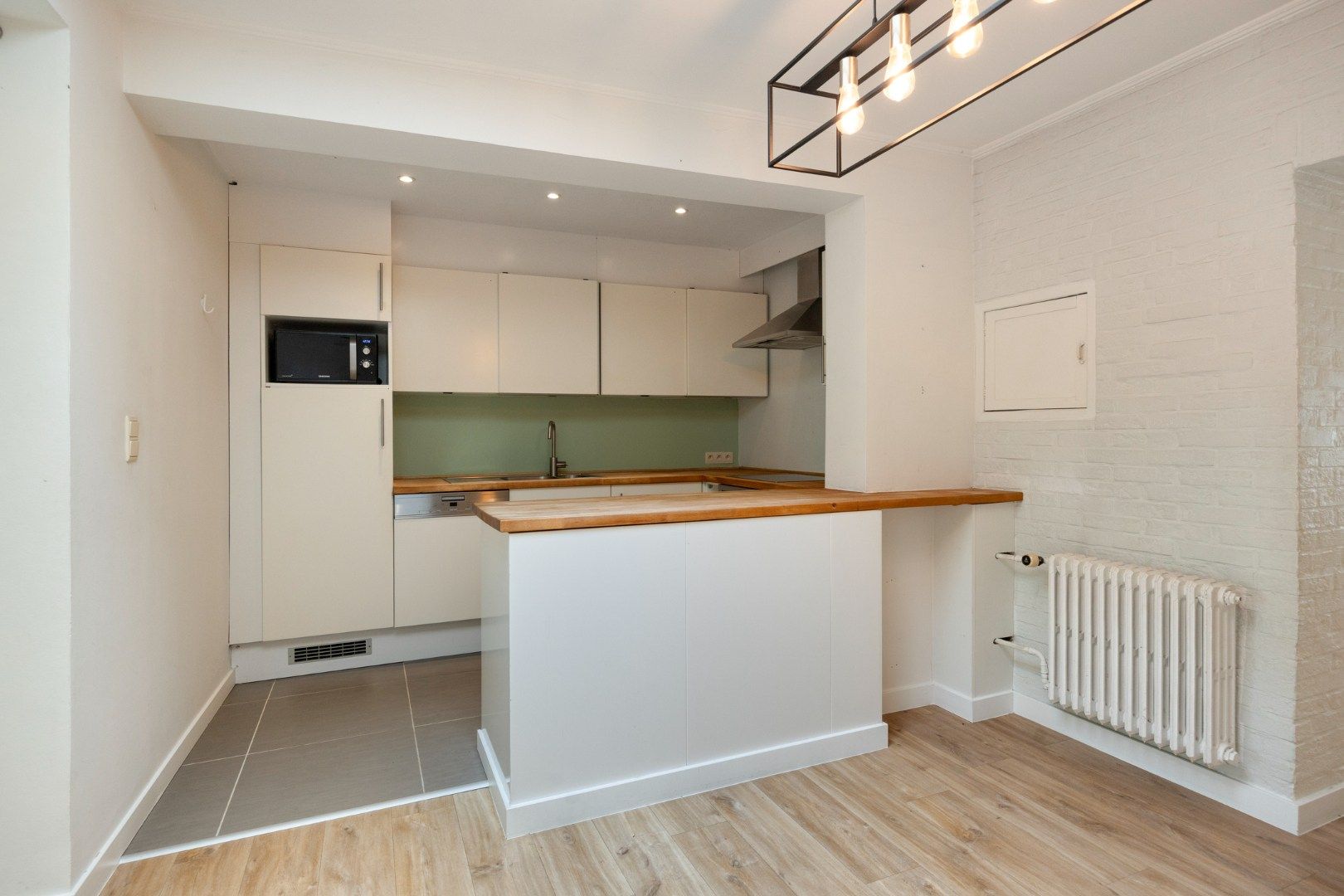 Recent gerenoveerde woning met 3 slaapkamers en prachtige tuin - EPC 141 kWh/m² - bewoonbare oppervlakte 137 m²         foto 9