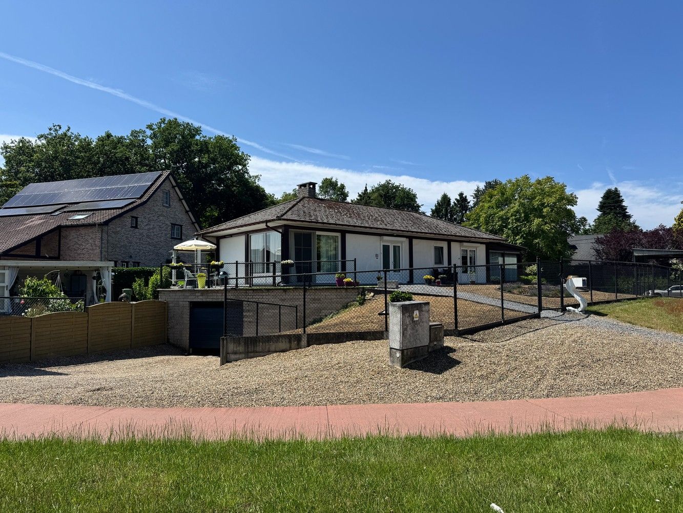 Hoofdfoto van de publicatie: Te koop: veelzijdige gezinswoning met kangoeroemogelijkheid op topligging in Zutendaal (Wiemesmeer)