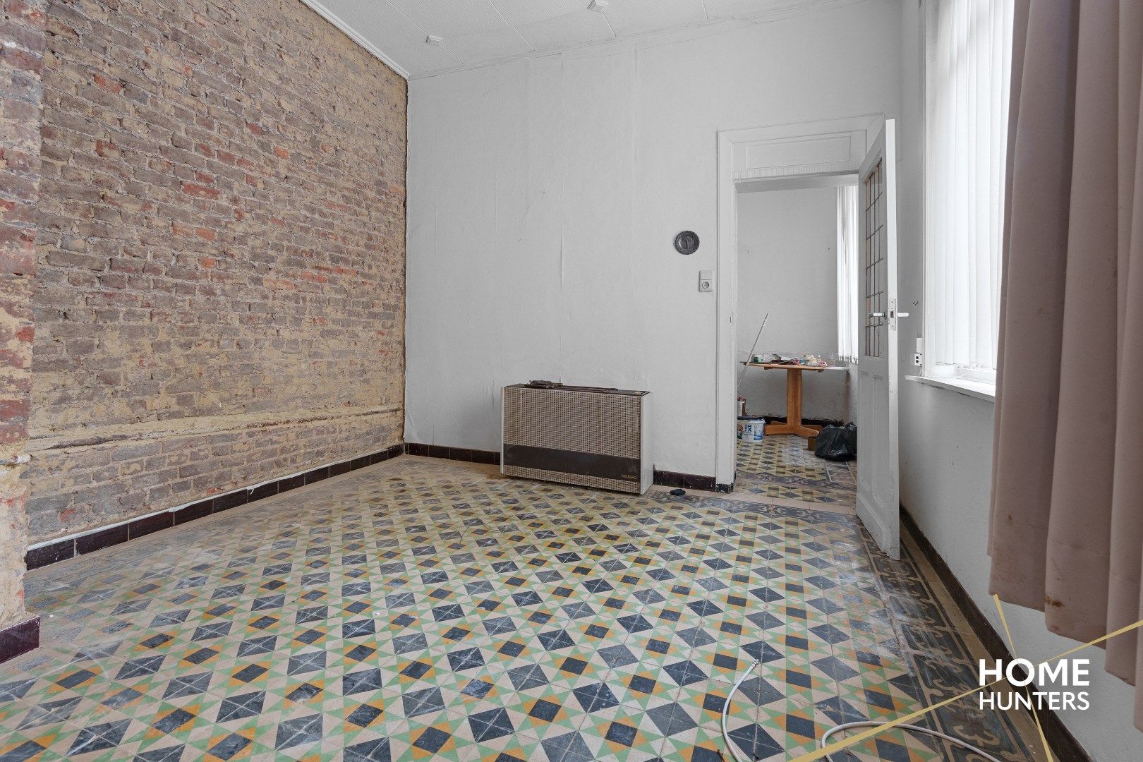 Te renoveren woning in het historische stadscentrum van Ieper foto 7