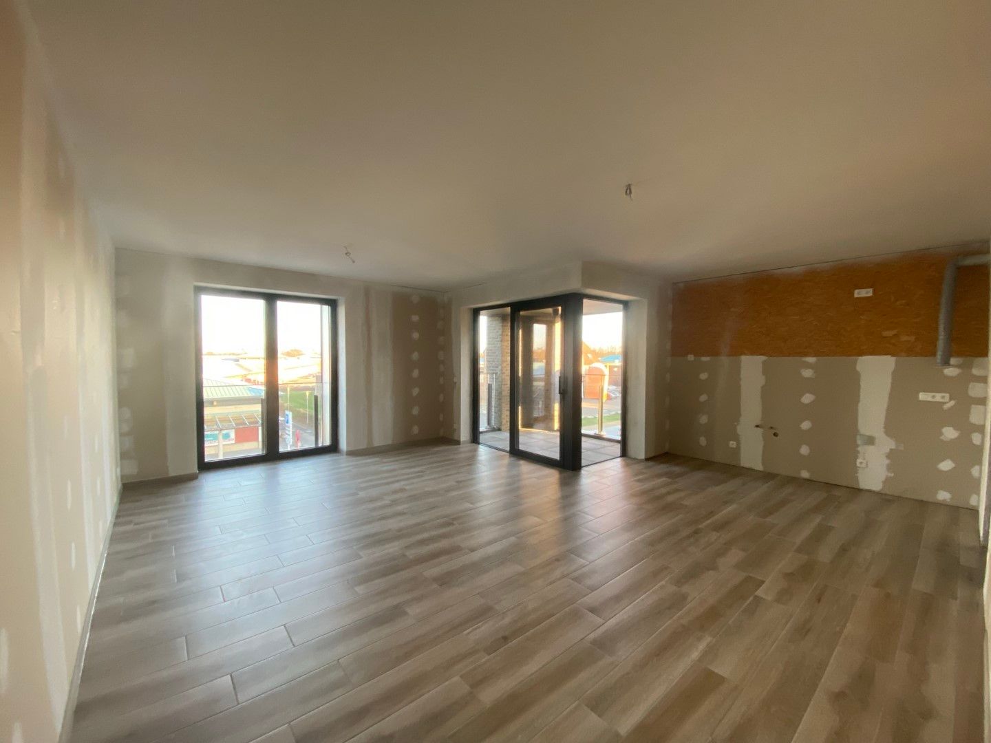 Nieuwbouwappartement met één slaapkamer gelegen in het commercieel centrum van Eisden. foto 2