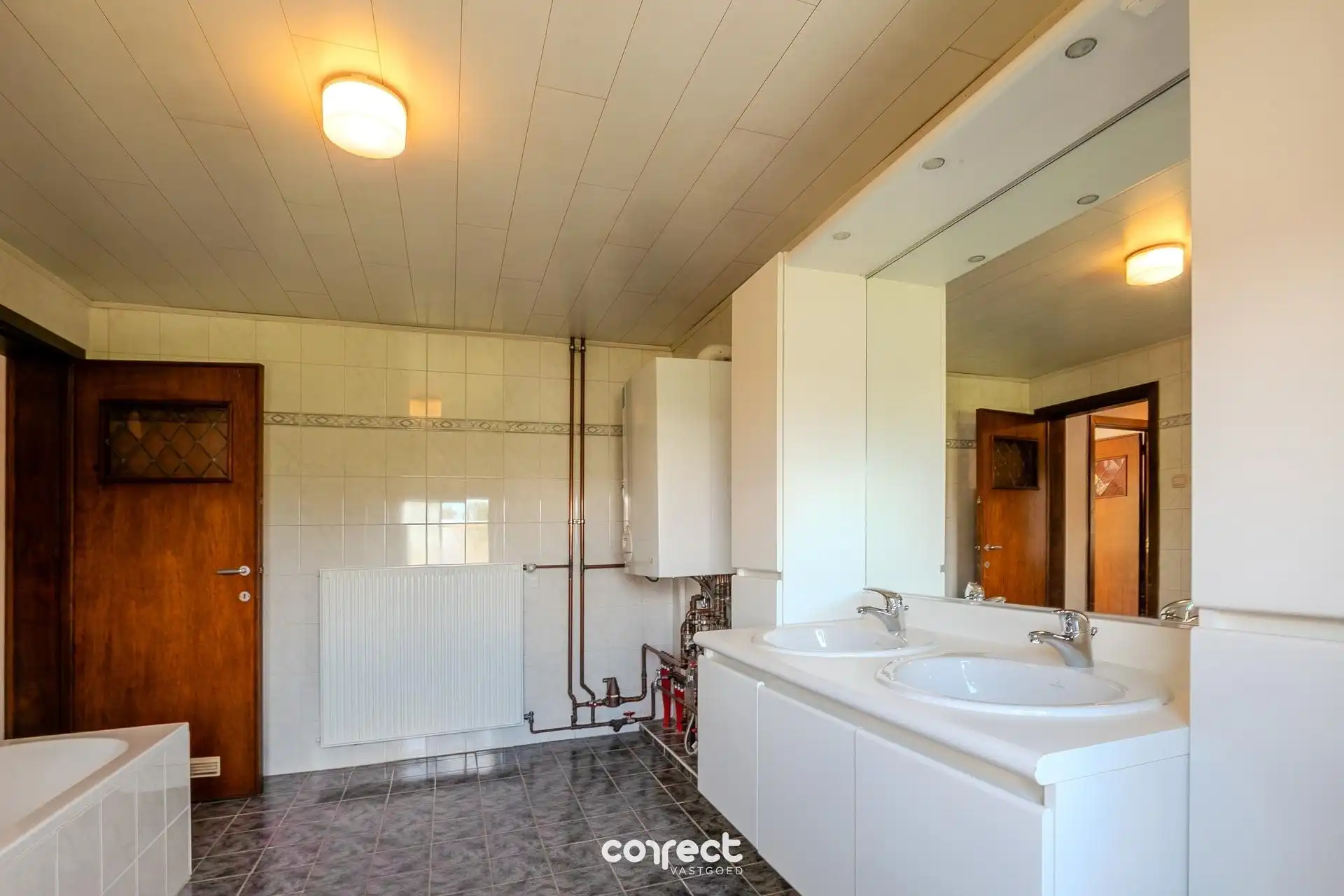 Verzorgde woning met 3 slpkrs, garage en tuin foto 6