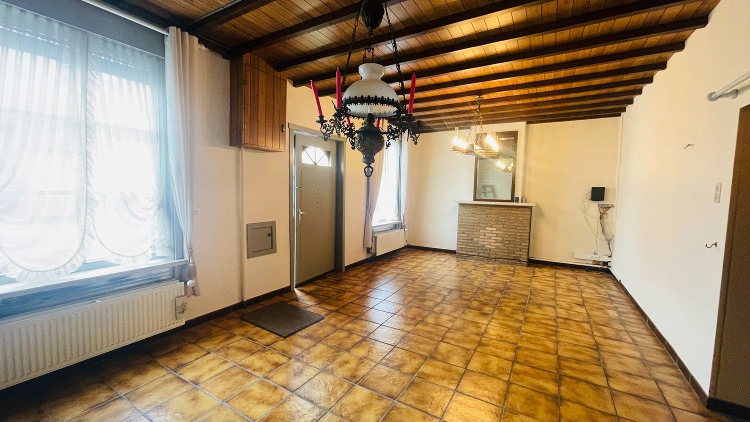 Centraal gelegen woning met 3 slpks, ruime volumes en zonnige buitenruimte foto 2