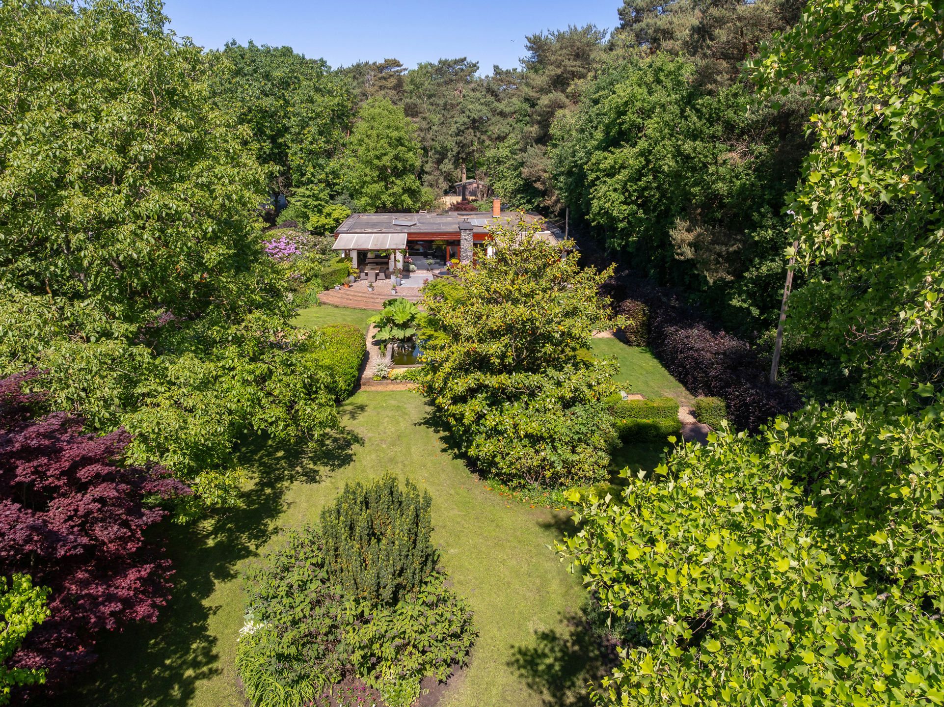 Laagbouwwoning op 2848 m² met Zwemvijver en Prachtige Tuin foto 39