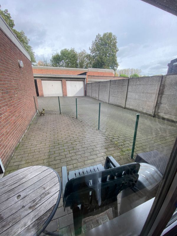 Gezellig gelijkvloers appartement met 2 slaapkamers en ingerichte dressing foto 9