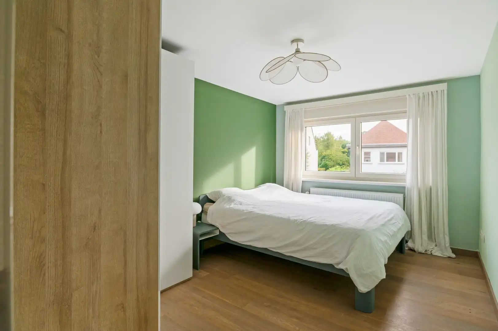 Lichtrijke 4-slpk woning met zuidtuin & tal van troeven foto 16