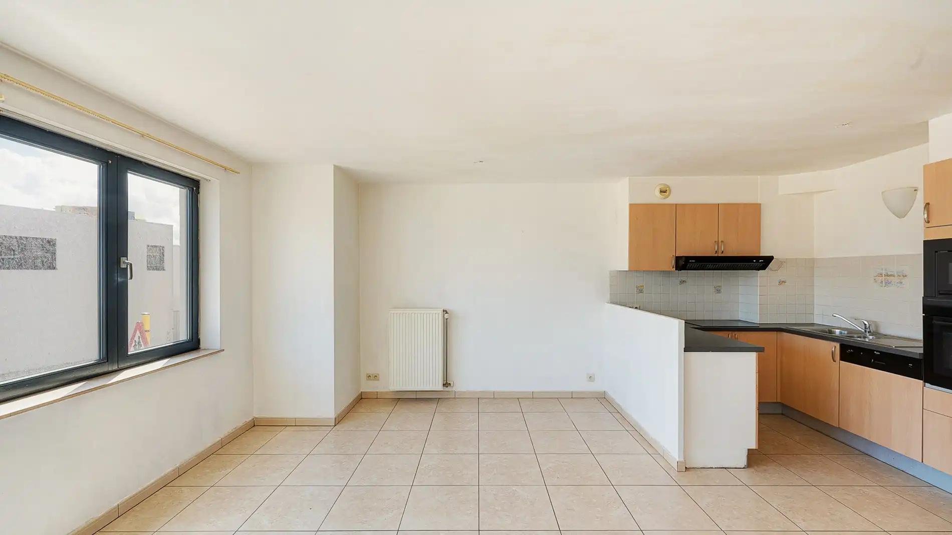 Verzorgd appartement op een centrale locatie te Heist. Garage mogelijk foto 3