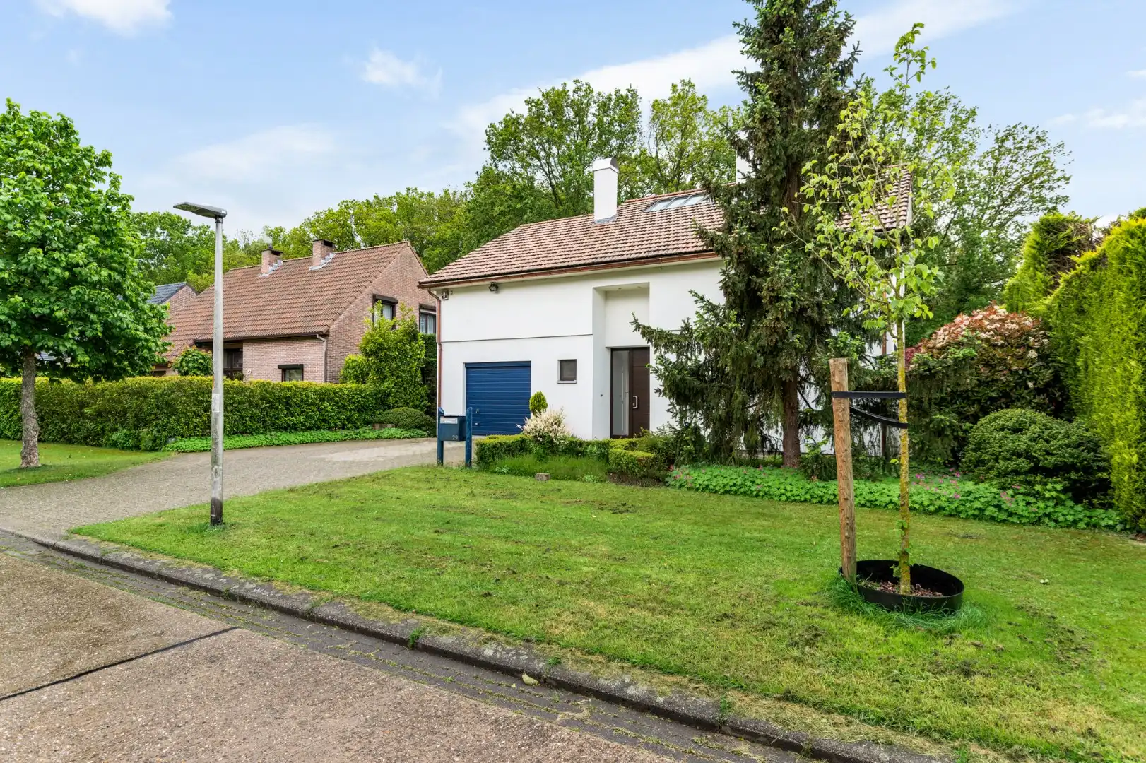 Topgelegen gezinswoning met zuidtuin in een groene woonwijk! foto 2