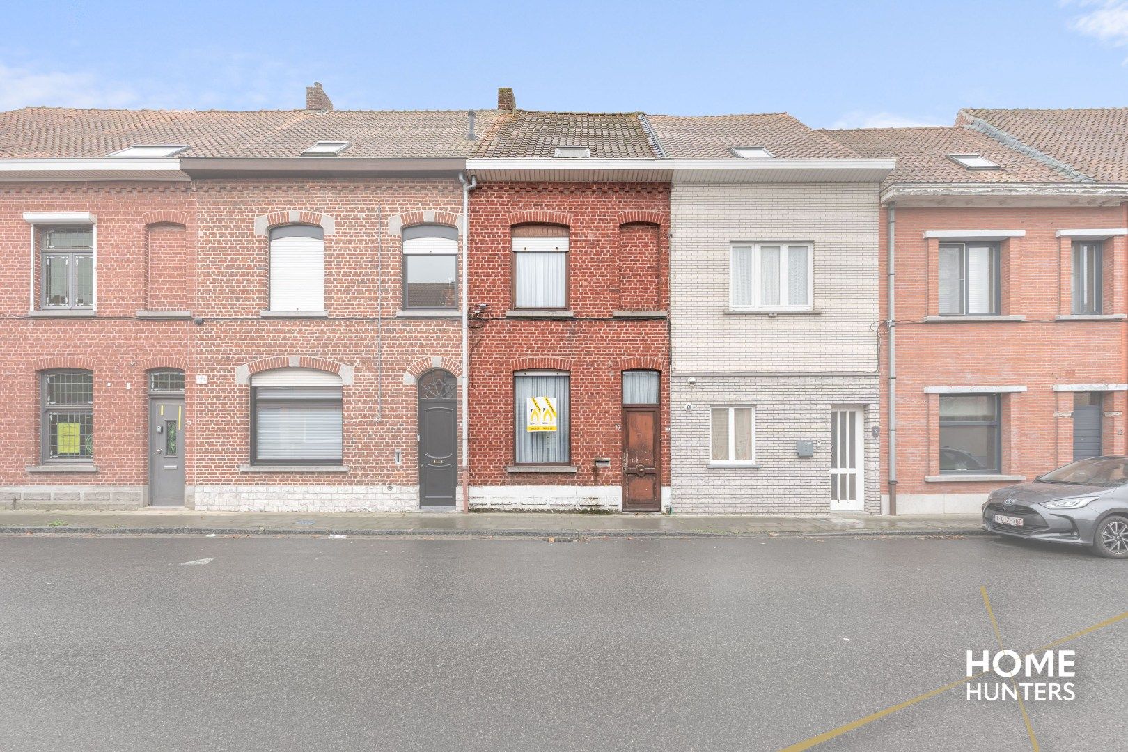 Charmante te renoveren rijwoning met 3 slaapkamers en diepe tuin op centrale ligging in Menen foto 29