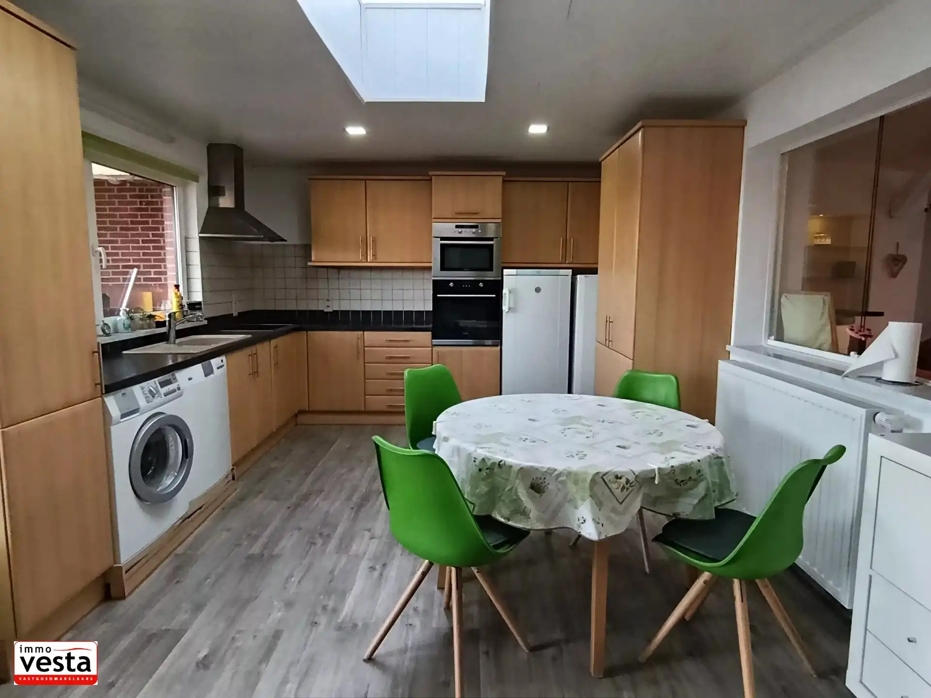 Ruime gezinswoning met 3 slaapkamers, garage en tuin  in Gingelom foto 5