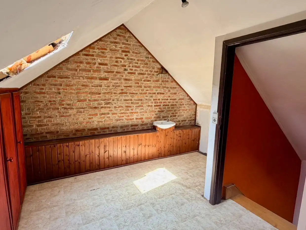 Ruime rijwoning met 4 slaapkamers, garage en tuin op toplocatie in Heverlee foto 18