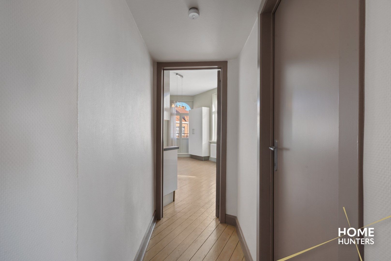 Gezellig duplexappartement met 3 slaapkamers en een zonnig terras te Ieper foto 7