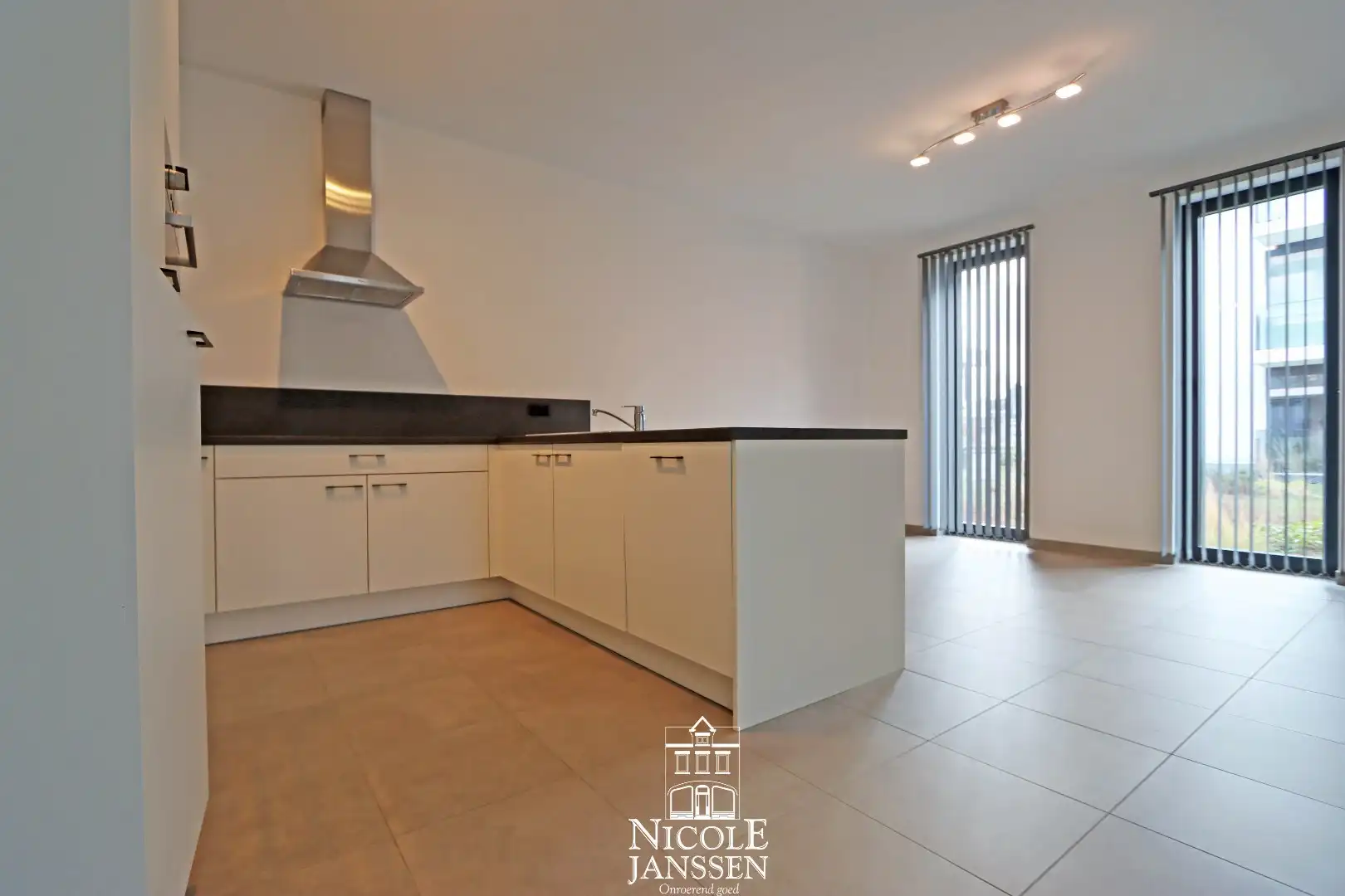 Gelijkvloers appartement met 2 slaapkamers, kelderberging en autostandplaats foto 6