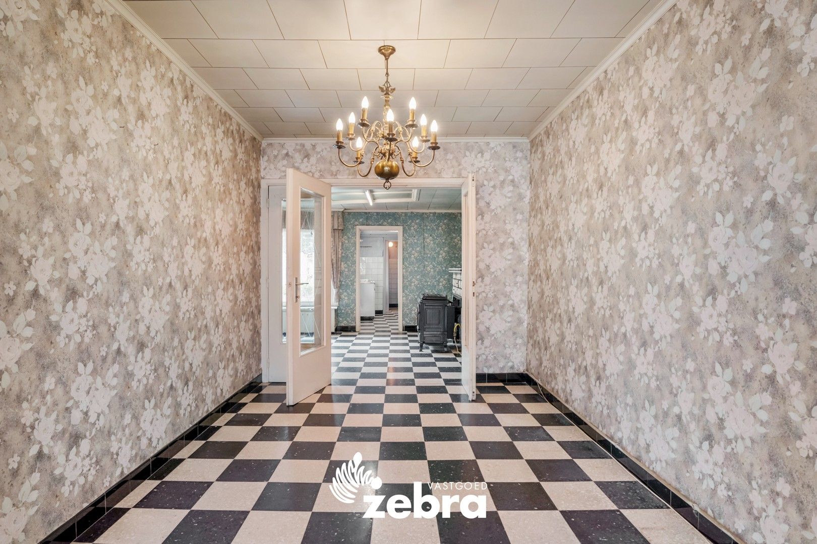 Te renoveren woning met 3 slaapkamers te Oostrozebeke! foto 6