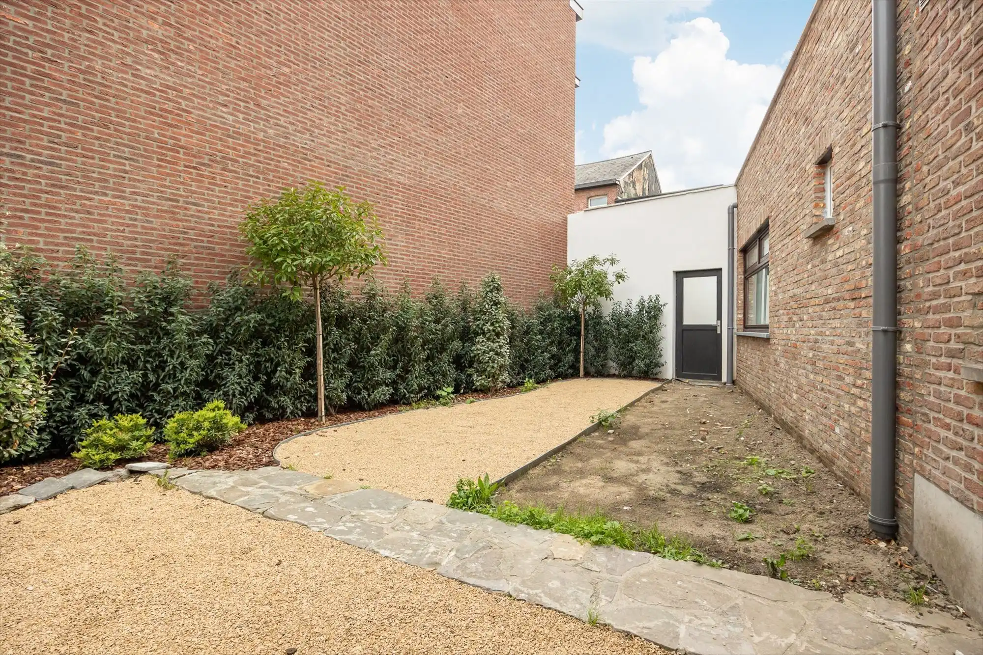 Gezinswoning woning met drie slaapkamers en tuin foto 20