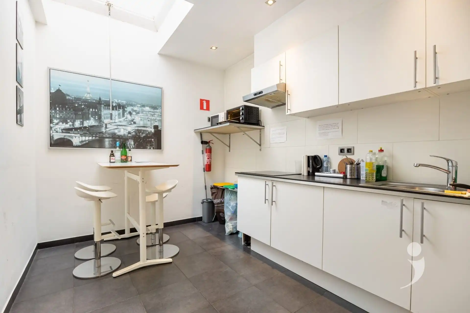 Opbrengsteigendom met handelspand, studio en 6 studentenkamers in Leuven foto 10