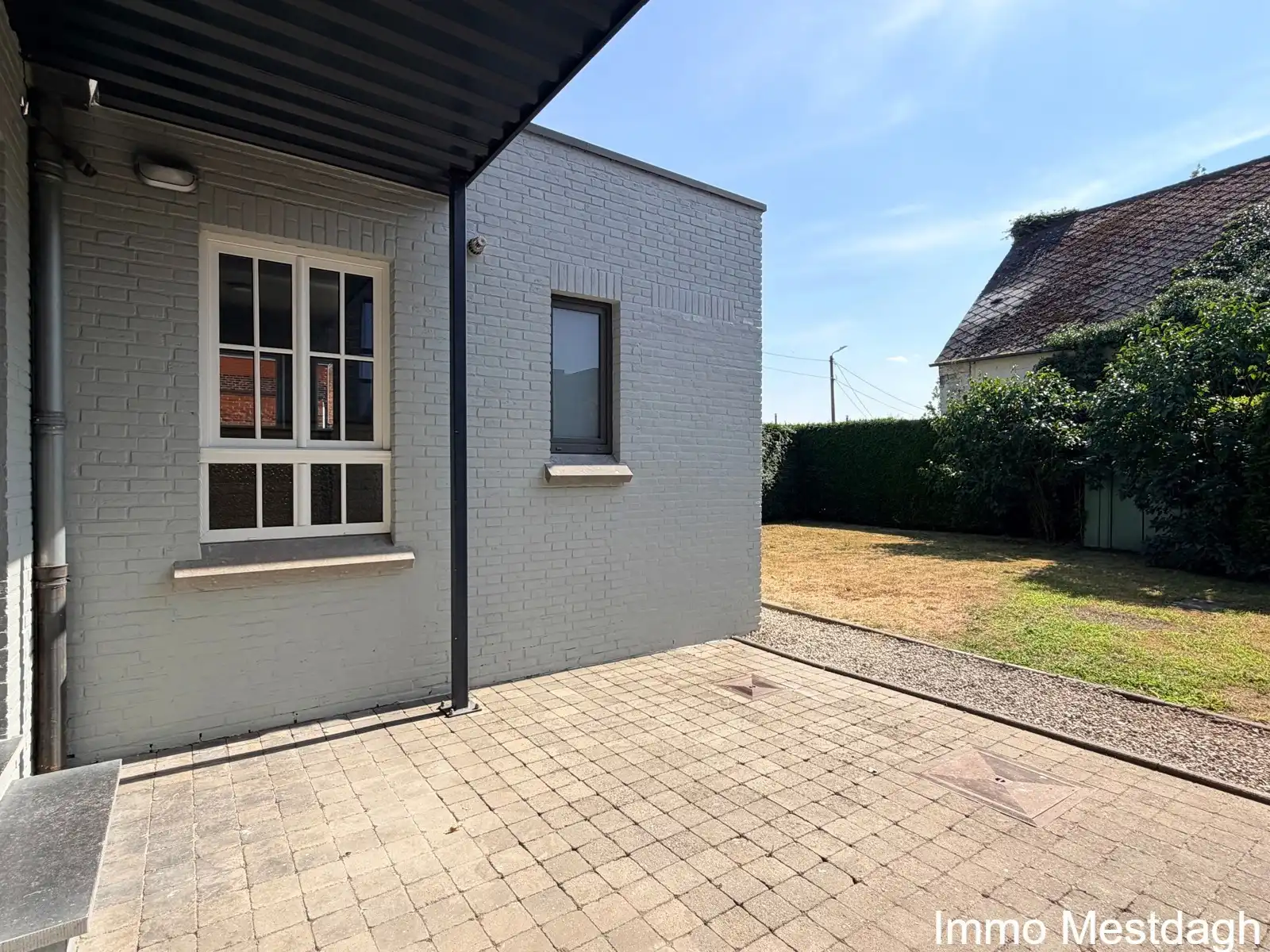 Prachtig gerenoveerd gelijkvloers appartement met terras en tuin in centrum Rummen foto 17