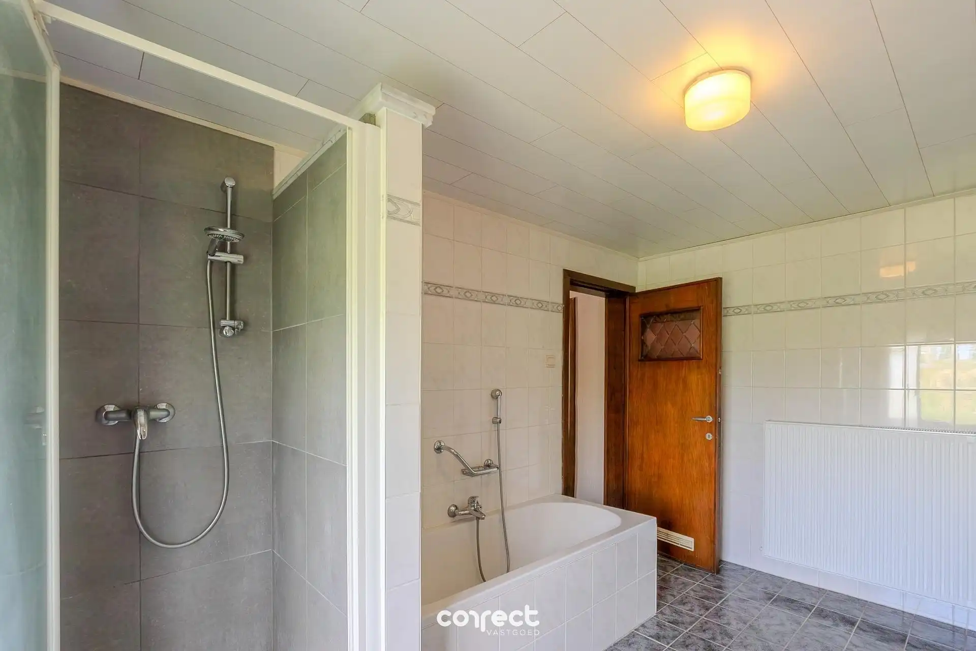 Verzorgde woning met 3 slpkrs, garage en tuin foto 7