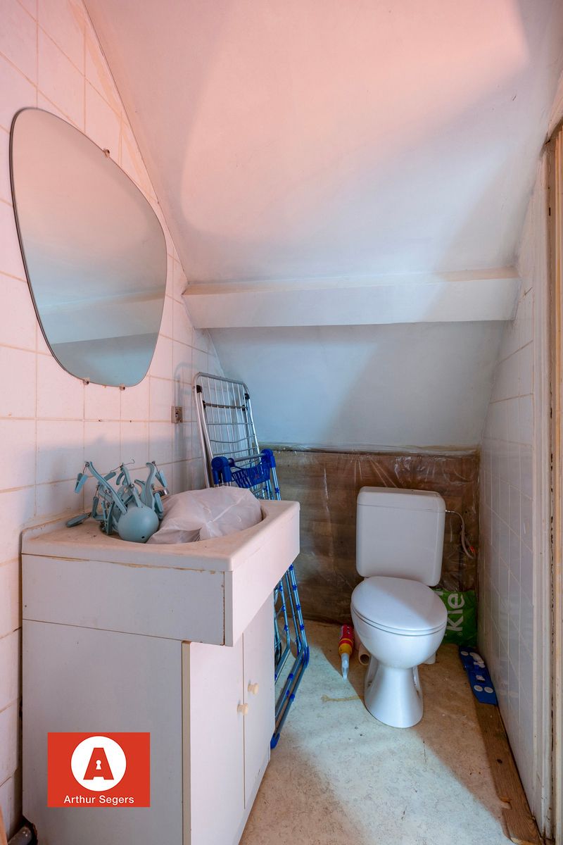 Woonhuis opgesplitst in 2 appartementen/woon-entiteiten foto 23