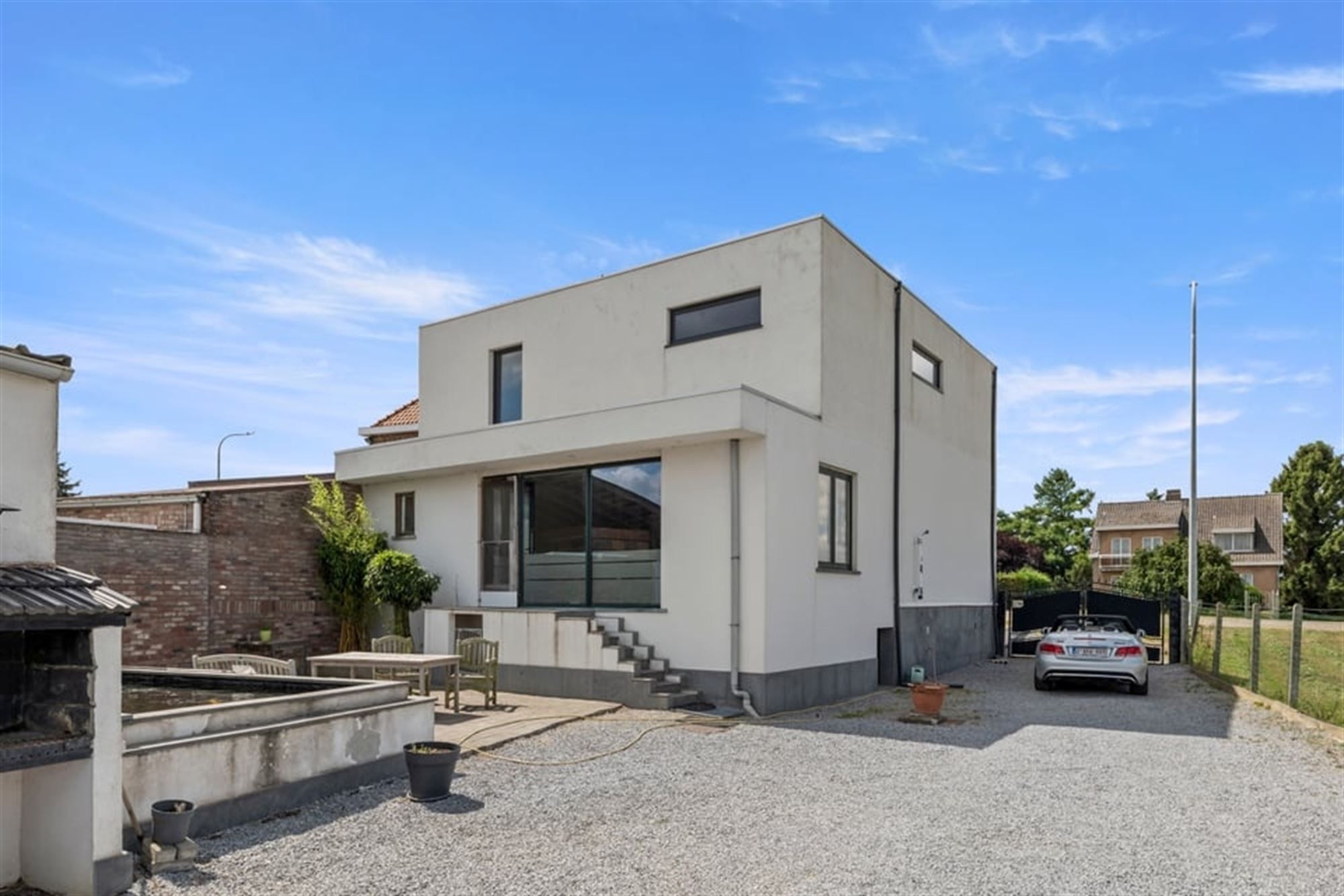 RUIME GEZINSWONIG MET VEEL POTENTIEEL EN EEN RUIME GARAGE IN SINT-TRUIDEN  foto 34