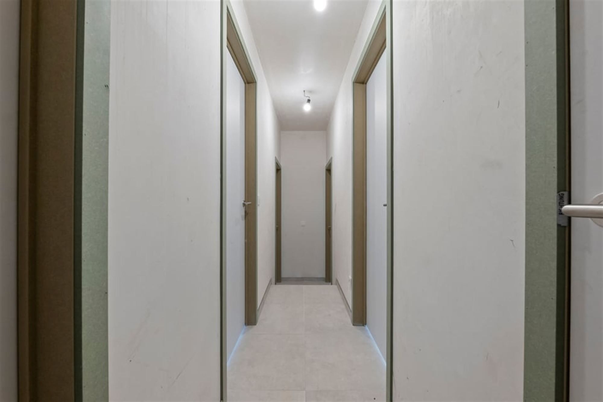 KNAP NIEUWBOUWAPPARTEMENT MET 3 SLKS IN HET CENTRUM VAN BORGLOON (MOGELIJKHEID AANKOOP 6% BTW) foto 17