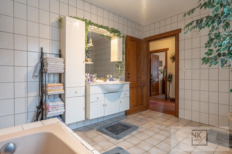 Charmante fermette woning met 4 slaapkamers, bureau en ruime werkplaats op een prachtig perceel in Arendonk! foto 31