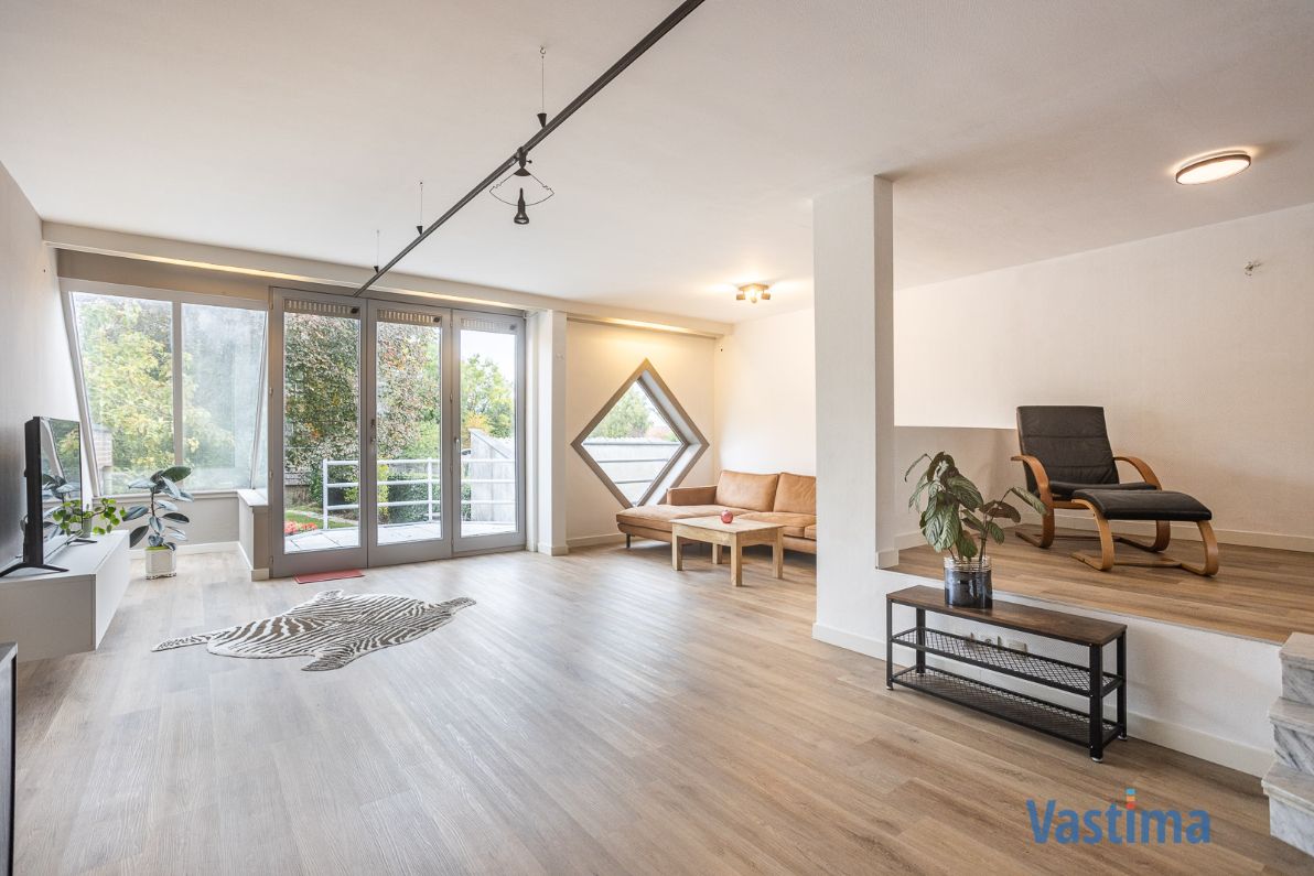 Instapklare architectenwoning met 4 slaapkamers, tuin en garage nabij centrum Erembodegem foto 3
