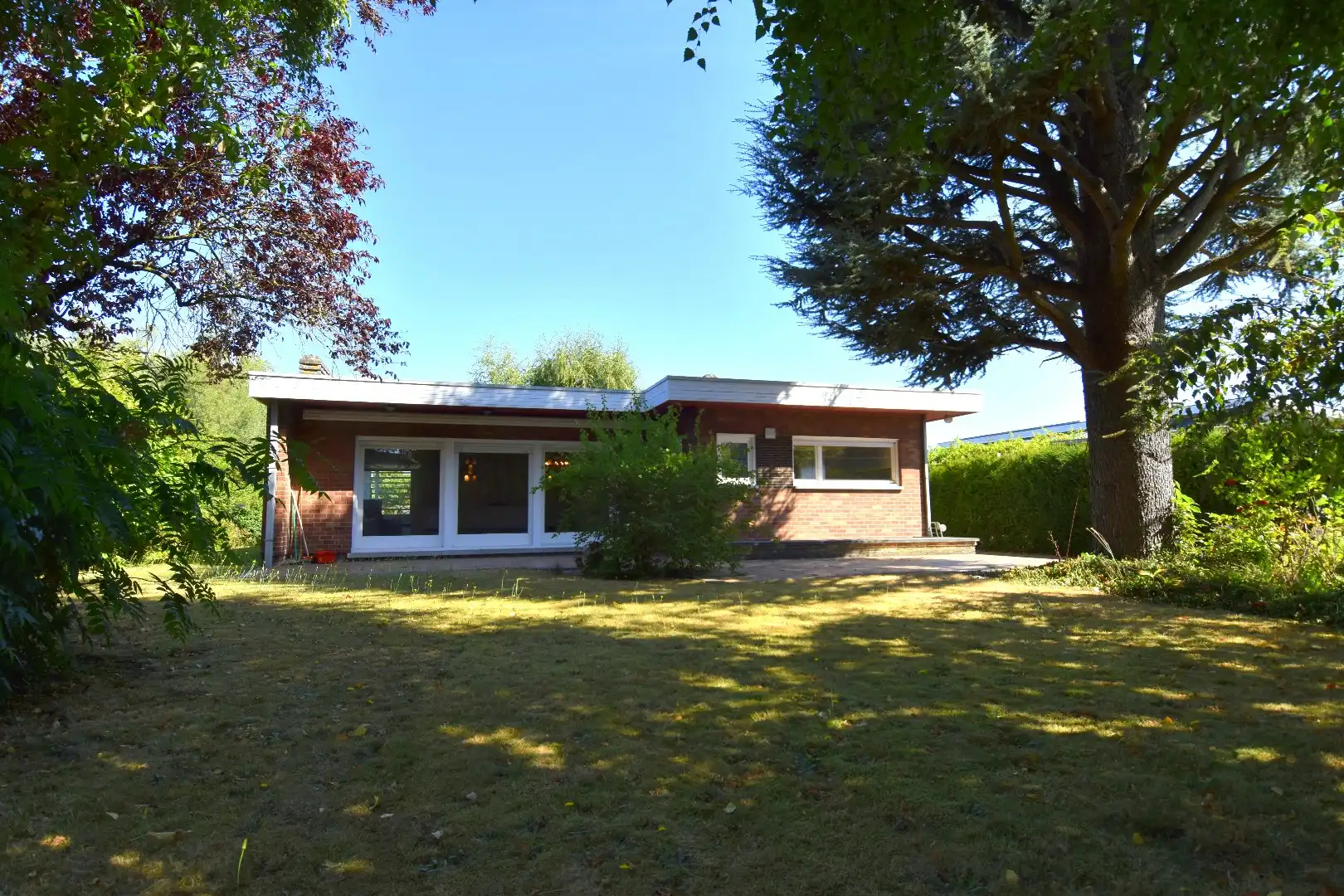 Alleenstaande woning met achterliggende opslag ruimte (205 m²) te koop in Heule foto 20