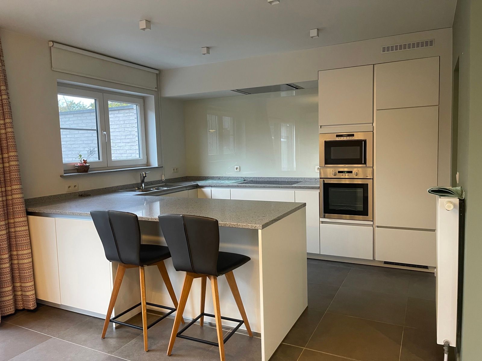 Moderne halfopen bebouwing met 3 slpks en tuin in Moerzeke foto 4