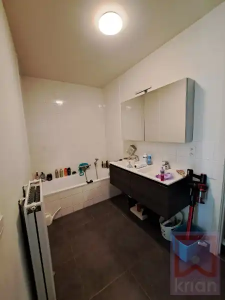 3-slpk appartement met terras, voor-en achtertuin, 2 autostapl. en 2 kelderbergingen. foto 12