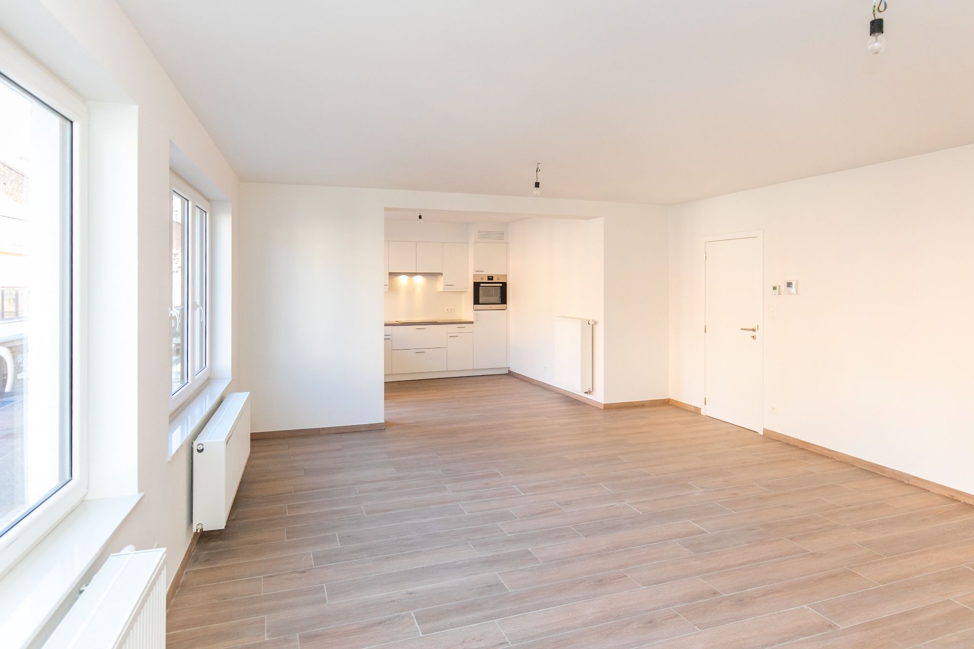 Ruim appartement met 2 slaapkamers in het centrum van Bilzen! foto 4