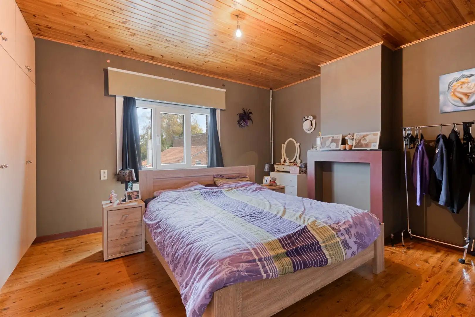 Verzorgde woning met diepe tuin, carport én uitweg! foto 15