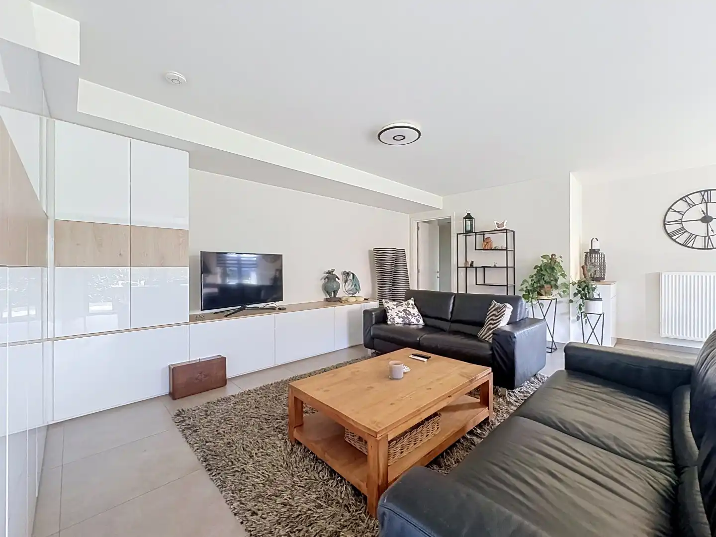 Lichtrijk gelijkvloers appartement met twee tuinen in Kessel-Lo! foto 9