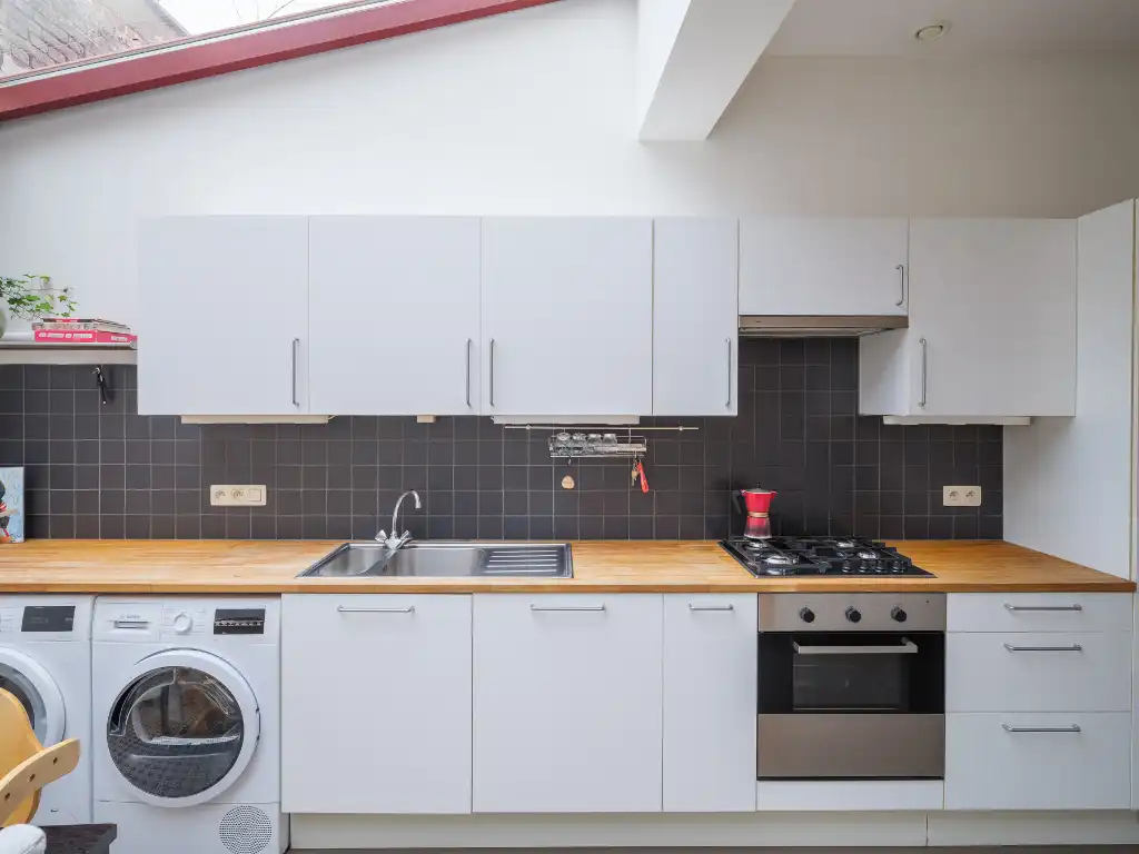 Instapklare stadswoning (EPC B) met twee slaapkamers, rustig gelegen nabij de Coupure foto 6