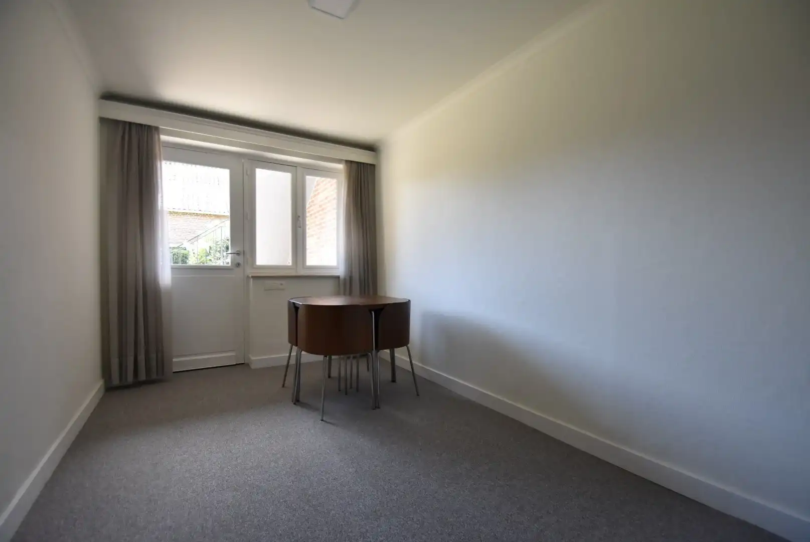 Knappe rijwoning met inpandige garage en mooie tuin in het centrum van Riemst foto 23