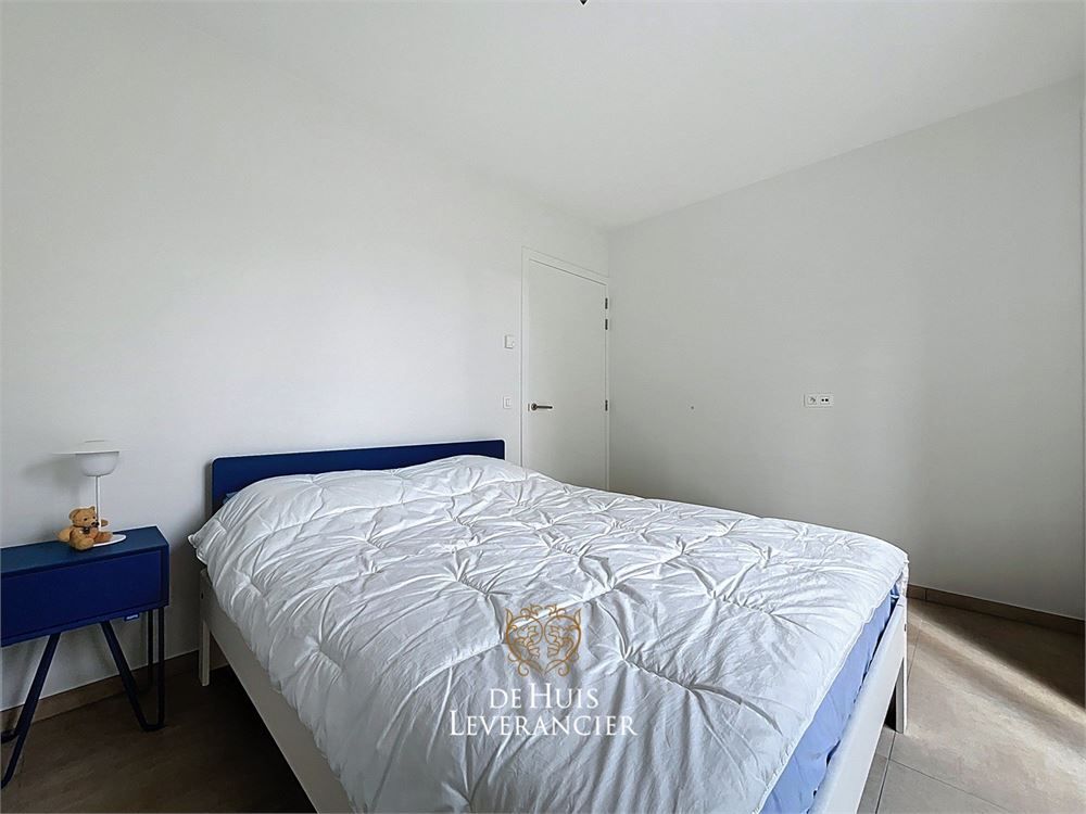 Discrete luxe & tijdloze elegantie : subliem nieuwbouwappartement met terras en gemeenschappelijk tuin te koop in Boechout foto 14