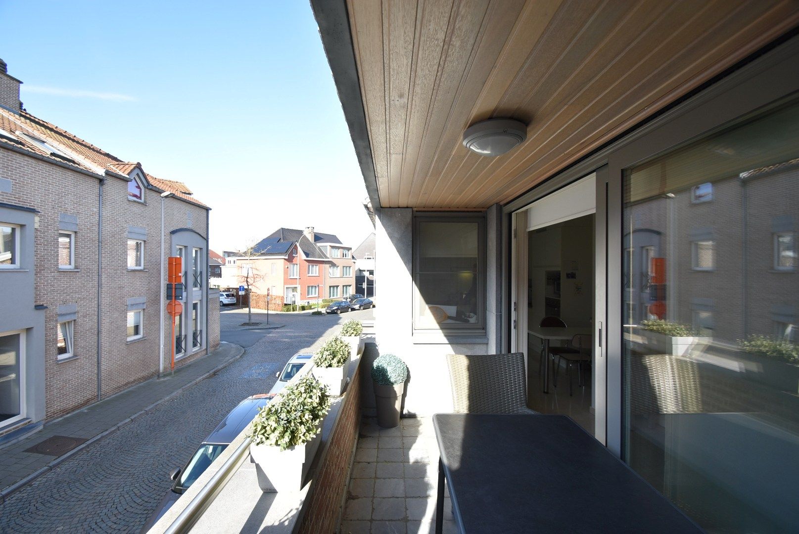 Zeer nette en ruime stadswoning/duplex-appartement met inpandige garage in hartje Bilzen foto 17