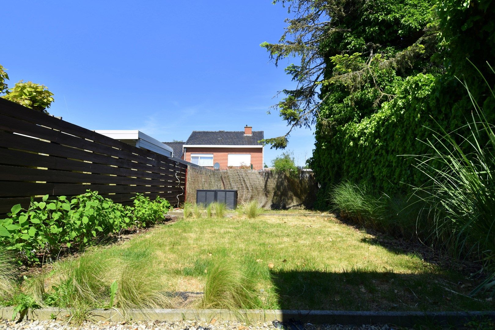 Instapklare rijwoning met 2 slaapkamers en mooi stukje tuin te koop in Moorsele foto 12