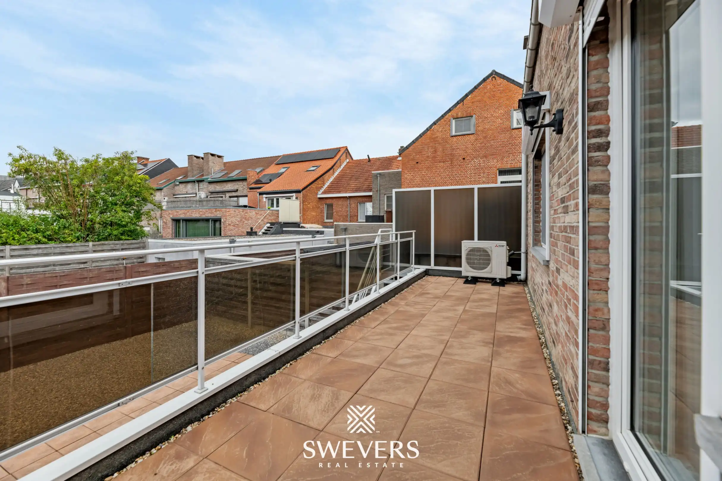 Ruim 2-slaapkamerappartement met groot terras en privéparking in centrum Beringen foto 22