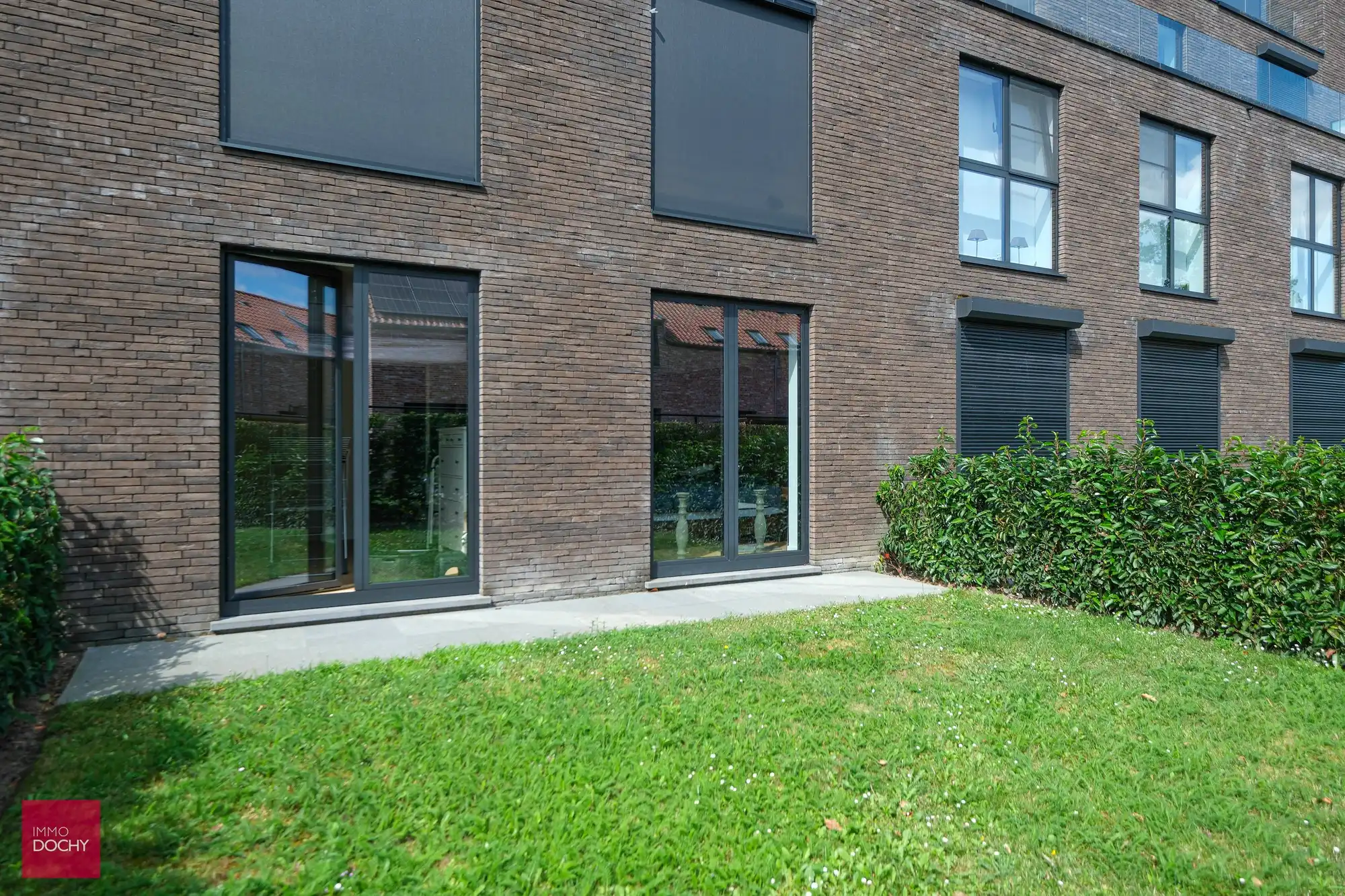 Gelijkvloers appartement met zongericht terras en tuin foto 15