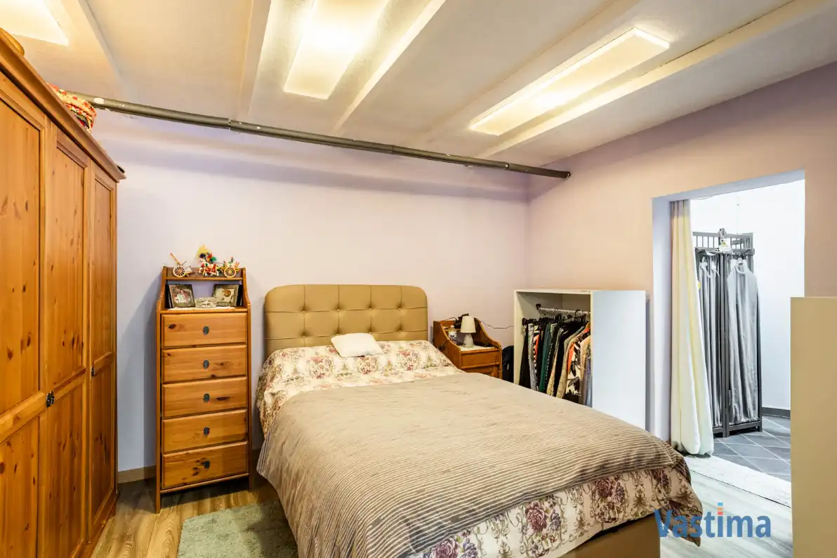 Uniek pand bestaande uit 2 woongelegenheden, garage en buitenruimte foto 11