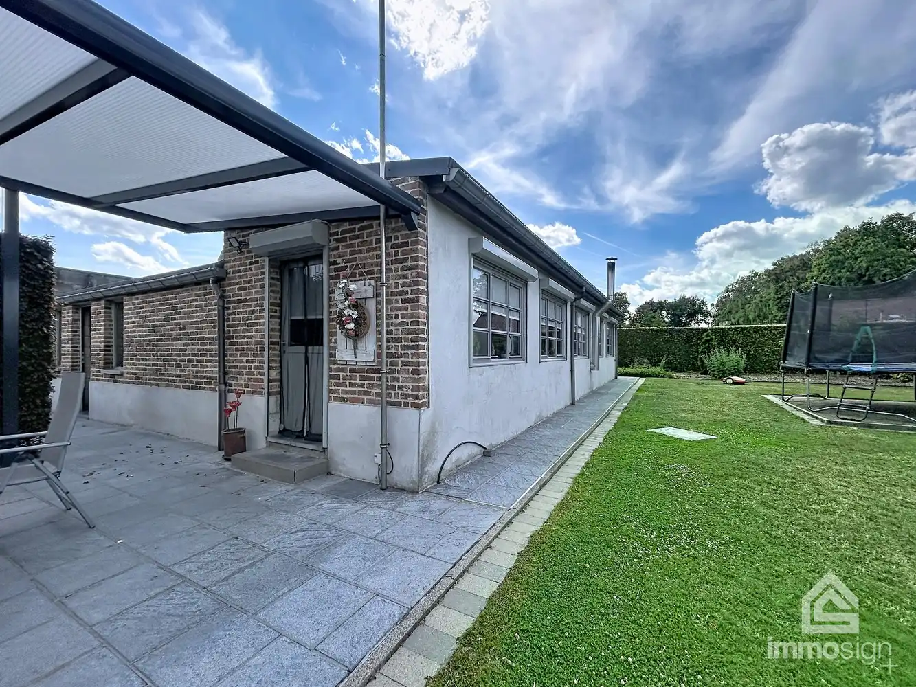 Ruime woning op bijna 2.000 m² grond met dubbele garage en werkhuis foto 11